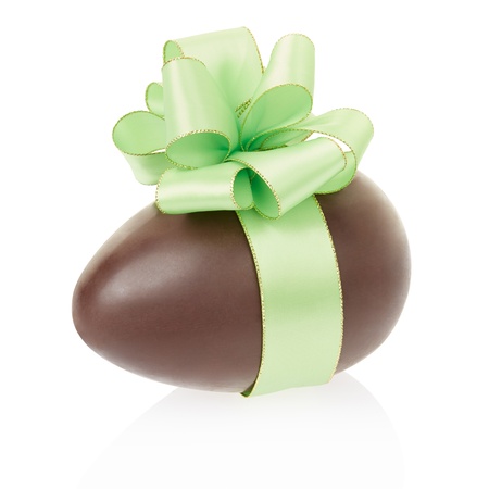 Chocolate egg with bow on white, clipping path includedの写真素材