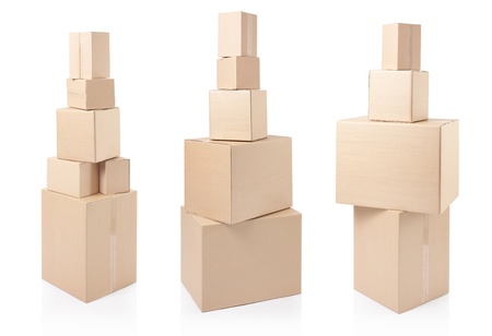 Cardboard boxes stacks on white, clipping path