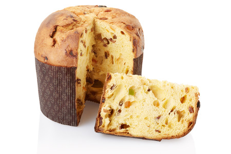 Panettone and slice isolated on white, clipping pathの写真素材