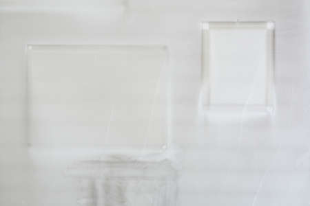 Canvas dusty traces on old white wall