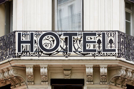 Hotel sign on balcony in Europeの写真素材