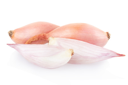 Shallot onions and half on white, clipping pathの写真素材
