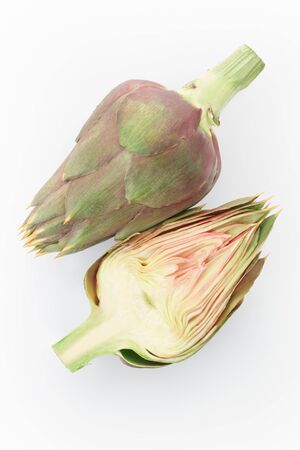 Artichoke and half on white, clipping path includedの写真素材