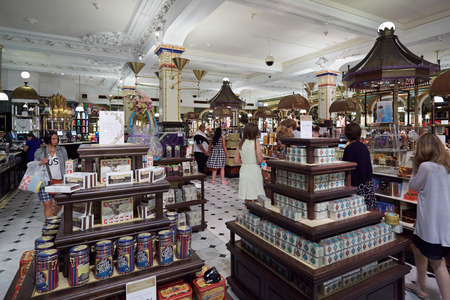 LONDON - AUGUST 7:  Harrods department store interior, candies and sweets area on August 7, 2015 in London, UK. Harrods is the biggest department store in Europe.のeditorial素材