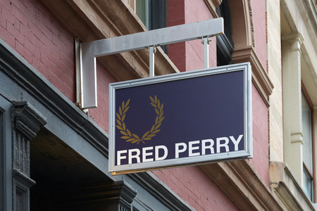 Fred Perry shop sign with golden laurel wreath in Wooster Street on September 7, 2016 in New York....