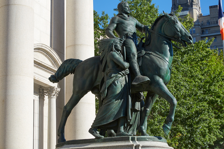 President Theodore Roosevelt equestrian statue in front of American Museum of Natural History in a sunny day, blue sky on September 13, 2016 in New York. It is an artwork of James Earle Fraser and dedicated in 1940.のeditorial素材