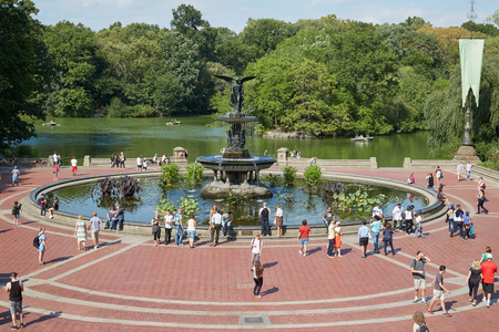 Bethesda Fountain with people view from the terrace in Central Park in a sunny day on September 10, 2016 in New York. The pool has a fountain sculpture designed by Emma Stebbins in 1868.のeditorial素材