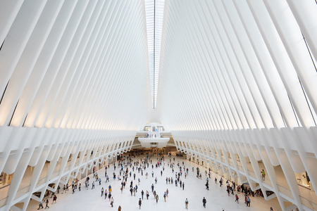 NEW YORK - SEPTEMBER 8: Oculus interior of the white World Trade Center station with people on September 8, 2016 in New York. The station was designed by Santiago Calatrava, Spanish architect and engineer.のeditorial素材