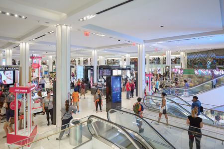 NEW YORK - SEPTEMBER 10: Macy's department store interior, cosmetics area with escalators on...
