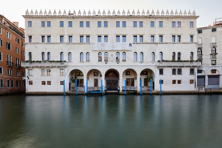 VENICE, ITALY - AUGUST 15, 2017: Fondaco dei Tedeschi, luxury department store building with grand canal in the early morningのeditorial素材