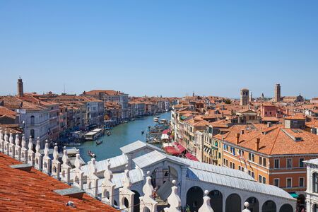 VENICE, ITALY - AUGUST 15, 2017: Grand canal and Rialto bridge view from Fondaco dei Tedeschi, luxury department store terrace in a sunny summer dayのeditorial素材