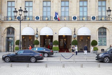 PARIS, FRANCE - JULY 07, 2018: Ritz luxury hotel in place Vendome in Paris with people in a sunny dayのeditorial素材