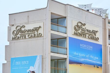 MONTE CARLO, MONACO - AUGUST 19, 2016: Fairmont luxury hotel building facade with signs in a summer day in Monte Carlo, Monaco.のeditorial素材