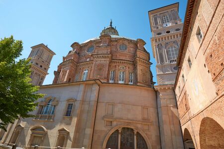 Sanctuary of Vicoforte church with bricks dome and wall in a sunny day, blue sky in Piedmont, Italyのeditorial素材