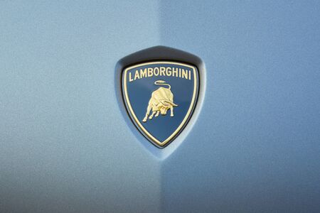 MONTE CARLO, MONACO - AUGUST 19, 2016: Lamborghini gray luxury car logo with golden bull in a summer day in Monte Carlo, Monaco.のeditorial素材