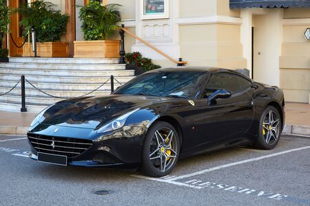 MONTE CARLO, MONACO - AUGUST 21, 2016: Ferrari California black luxury car in a summer day in Monte Carlo, Monaco.のeditorial素材