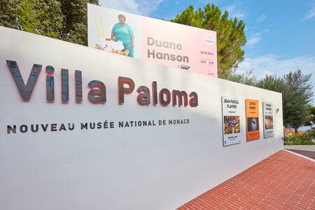 MONTE CARLO, MONACO - AUGUST 20, 2016: Villa Paloma contemporary art museum sign and Duane Hanson exhibition billboard in a summer day in Monte Carlo, Monaco.のeditorial素材