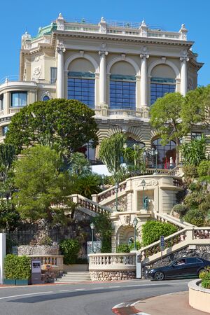 MONTE CARLO, MONACO - AUGUST 21, 2016: Staircase with mediterranean vegetation and casino building in a sunny summer day in Monte Carlo, Monaco.のeditorial素材
