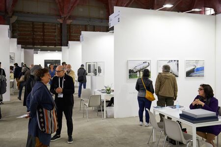 TURIN, ITALY - MAY 4, 2019: The Phair photography art fair interior at Borsa Valori with visitors in Turin, Italy.のeditorial素材