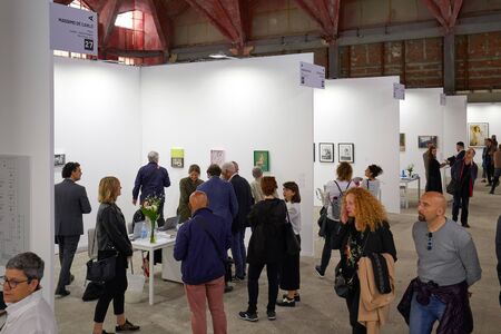 TURIN, ITALY - MAY 4, 2019: The Phair photography art fair interior at Borsa Valori with visitors in Turin, Italy.のeditorial素材