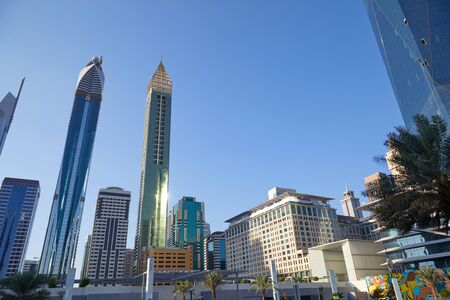 DUBAI, UNITED ARAB EMIRATES - NOVEMBER 23, 2019: Dubai financial district, modern skyscrapers low...