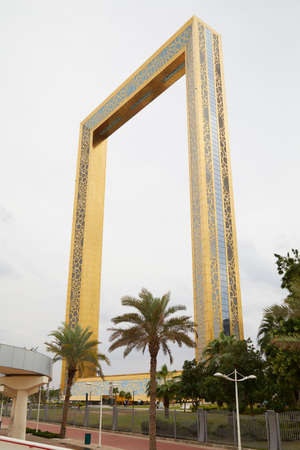 DUBAI, UNITED ARAB EMIRATES - NOVEMBER 21, 2019: Dubai Frame, golden observation attraction in a cloudy dayのeditorial素材