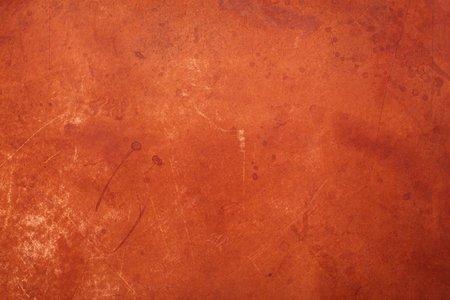 Brown, stained and worn leather texture backgroundの写真素材