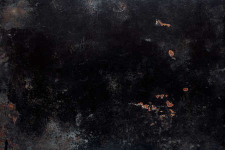 Black, corroded metal texture backgroundの写真素材