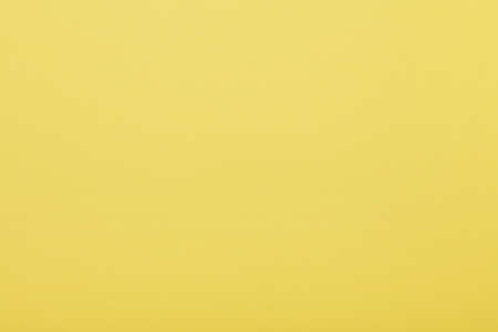 Yellow paper texture backgroundの写真素材