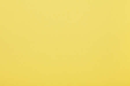 Light yellow paper texture backgroundの写真素材