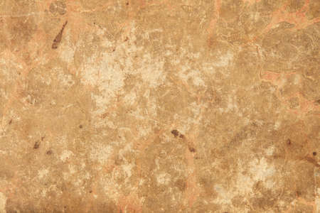 Old brown worn paper texture backgroundの写真素材