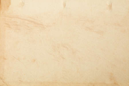 Old paper with stains and humidity signs texture backgroundの写真素材