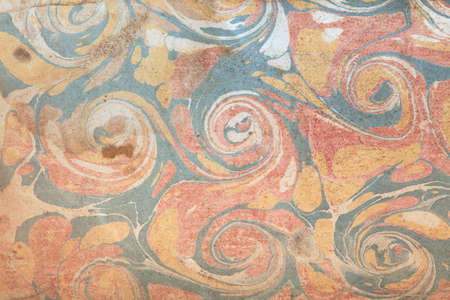 Old paper with abstract, colorful designs texture backgroundの写真素材