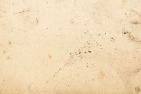Old paper with black dust signs and scratches texture backgroundの写真素材