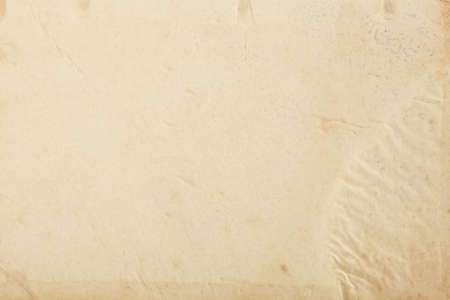 Old paper with stained part and humidity signs texture backgroundの写真素材