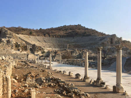 Roman amphitheater ruins end to the main road with stone columns row in ephesus Archaeological site...