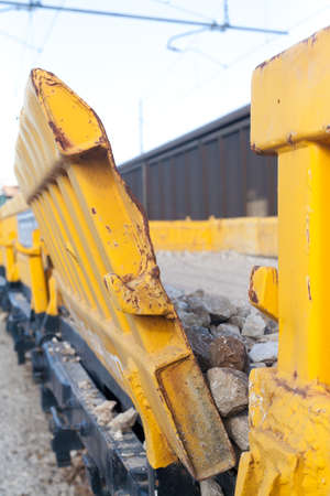Stone transport freight train wagon in railway depotの写真素材