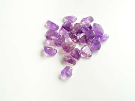 Tumbled Amethyst stones close up for crystal therapy treatments and reikiの写真素材