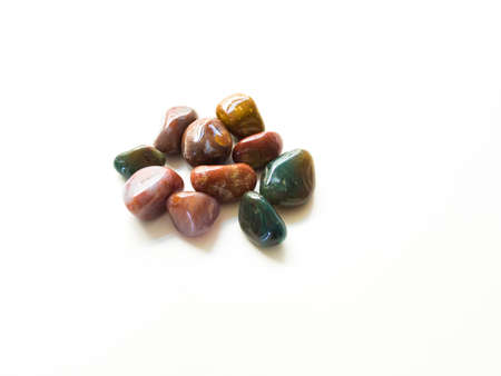 Tumbled jasper stones for crystal therapy treatments and reiki detail colorfulの写真素材