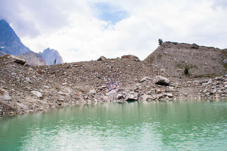Miage Lake with little person runningの写真素材