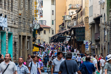 FLORENCE, ITALY - JUNE, 2014: Tourists walk on the bridge Ponte Vecchio in Florenceのeditorial素材