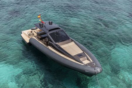 inflatable motor boat in formentera, navigate in the beautiful sea of baleares islandsの写真素材