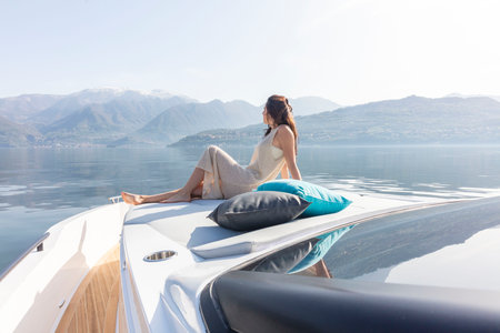 young amazing woman relaxing on the yachtの写真素材