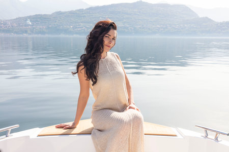 young amazing woman relaxing on the yachtの写真素材