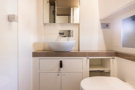 yacht Interior of a modern bathroom with white bathtub and toilet. Nobody insideの写真素材