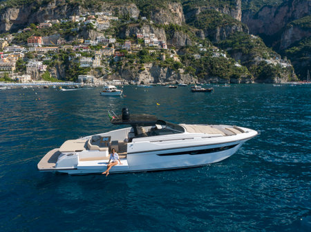Woman on a yacht on the Amalfi Coast, Italy.の写真素材