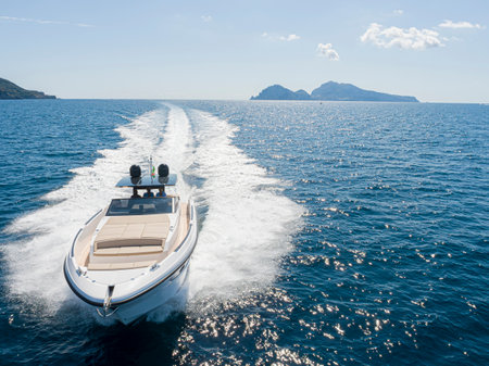Speed boat in the sea on a sunny day. View from above.の写真素材