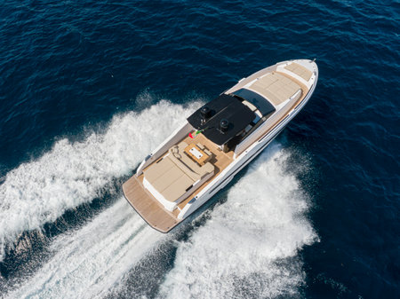 Aerial view of a luxury motor boat in the mediterranean seaの写真素材
