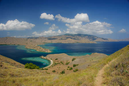 Bay island komodo from the surrounding hillsの写真素材