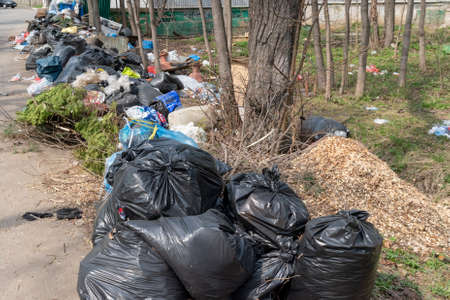 Moscow region, Russia - April 26, 2019: Garbage dump on the side of the road. The problem with the...
